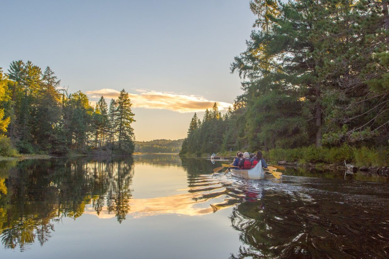 Canoes on the Oxtongue River at dusk